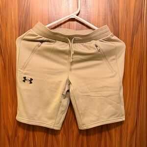 Under Armour boys size medium. Performance Tan Shorts